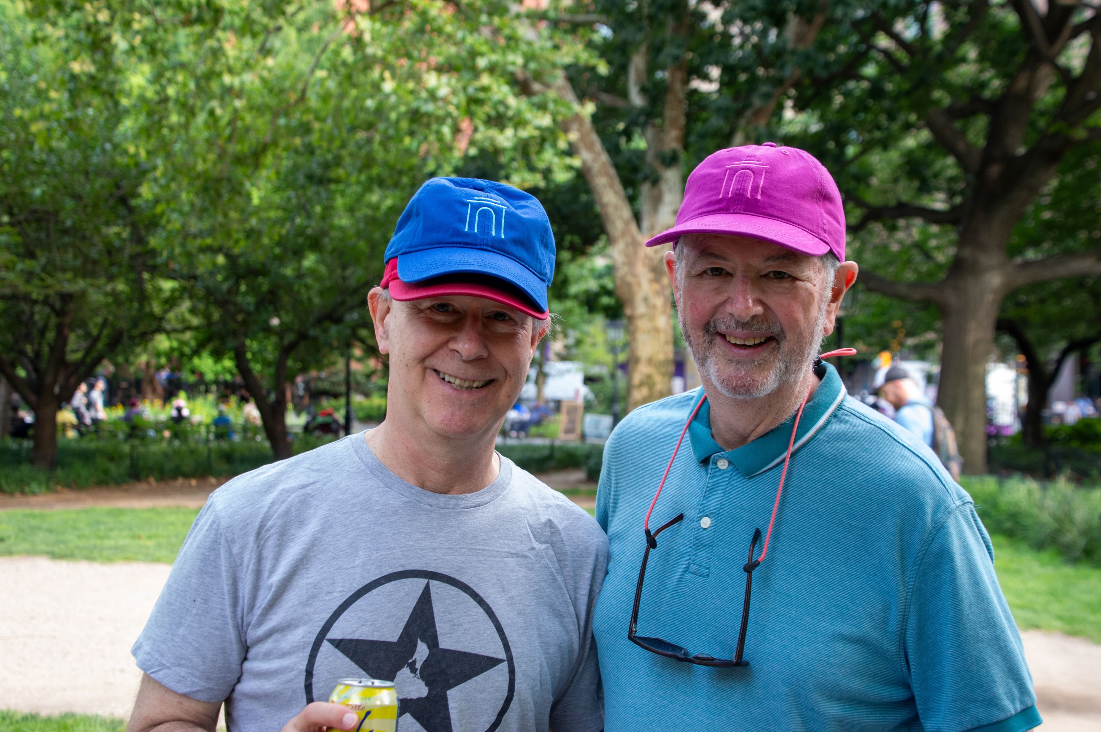 Members wearing hats in the park